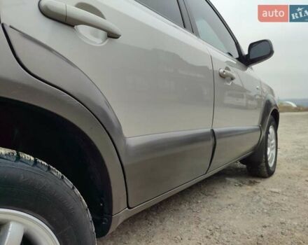 Серый Хендай Туксон, объемом двигателя 1.99 л и пробегом 210 тыс. км за 7900 $, фото 8 на Automoto.ua