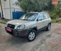 Сірий Хендай Туксон, об'ємом двигуна 2 л та пробігом 197 тис. км за 7800 $, фото 4 на Automoto.ua