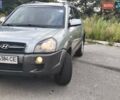Серый Хендай Туксон, объемом двигателя 1.98 л и пробегом 260 тыс. км за 6800 $, фото 2 на Automoto.ua