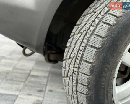 Серый Хендай Туксон, объемом двигателя 1.98 л и пробегом 252 тыс. км за 6950 $, фото 26 на Automoto.ua