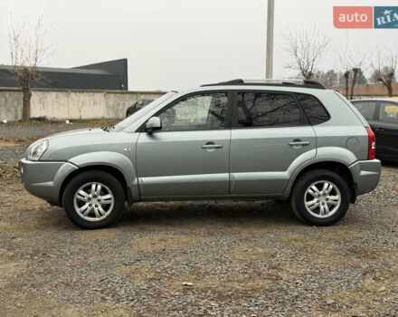 Серый Хендай Туксон, объемом двигателя 2 л и пробегом 231 тыс. км за 6999 $, фото 11 на Automoto.ua