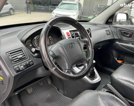 Сірий Хендай Туксон, об'ємом двигуна 2 л та пробігом 263 тис. км за 7440 $, фото 16 на Automoto.ua