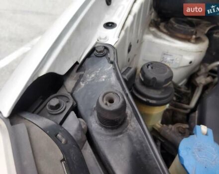 Серый Хендай Туксон, объемом двигателя 1.98 л и пробегом 278 тыс. км за 5300 $, фото 21 на Automoto.ua