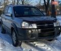 Серый Хендай Туксон, объемом двигателя 2.7 л и пробегом 294 тыс. км за 7500 $, фото 1 на Automoto.ua