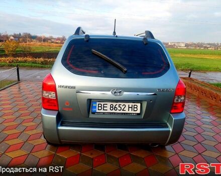 Серый Хендай Туксон, объемом двигателя 2 л и пробегом 175 тыс. км за 6250 $, фото 4 на Automoto.ua