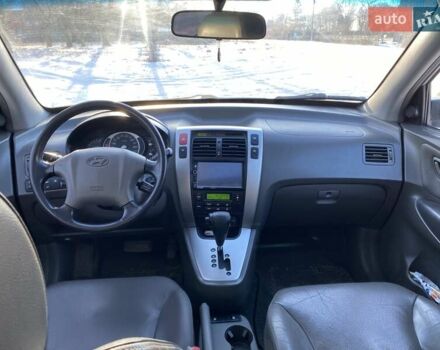 Серый Хендай Туксон, объемом двигателя 2.7 л и пробегом 294 тыс. км за 7500 $, фото 12 на Automoto.ua