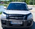 Серый Хендай Туксон, объемом двигателя 2 л и пробегом 258 тыс. км за 7500 $, фото 1 на Automoto.ua