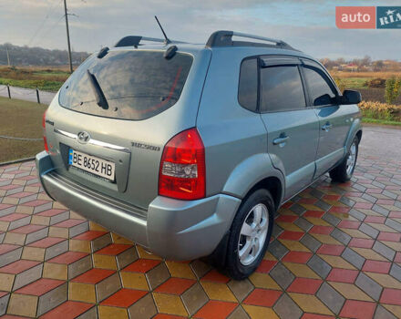 Серый Хендай Туксон, объемом двигателя 1.98 л и пробегом 175 тыс. км за 6050 $, фото 5 на Automoto.ua