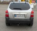 Сірий Хендай Туксон, об'ємом двигуна 2 л та пробігом 251 тис. км за 6999 $, фото 3 на Automoto.ua