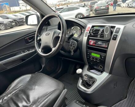 Сірий Хендай Туксон, об'ємом двигуна 2 л та пробігом 263 тис. км за 7440 $, фото 36 на Automoto.ua