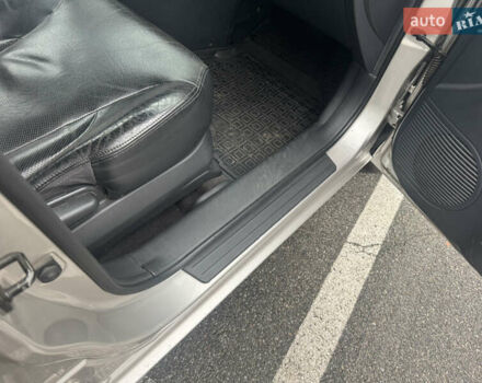 Серый Хендай Туксон, объемом двигателя 1.98 л и пробегом 175 тыс. км за 7800 $, фото 16 на Automoto.ua