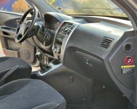 Серый Хендай Туксон, объемом двигателя 2 л и пробегом 188 тыс. км за 8800 $, фото 10 на Automoto.ua