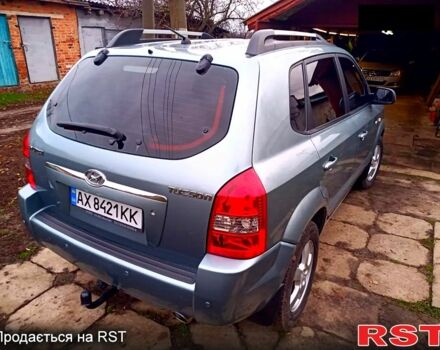 Серый Хендай Туксон, объемом двигателя 2 л и пробегом 179 тыс. км за 8500 $, фото 2 на Automoto.ua