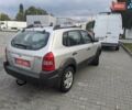 Серый Хендай Туксон, объемом двигателя 1.98 л и пробегом 168 тыс. км за 7500 $, фото 7 на Automoto.ua