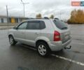 Серый Хендай Туксон, объемом двигателя 1.98 л и пробегом 250 тыс. км за 7300 $, фото 3 на Automoto.ua