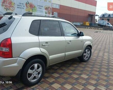 Серый Хендай Туксон, объемом двигателя 1.99 л и пробегом 303 тыс. км за 6500 $, фото 5 на Automoto.ua