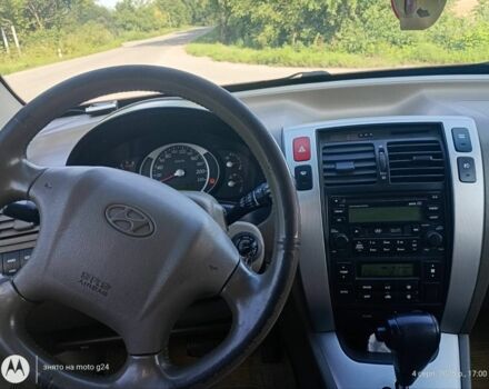 Сірий Хендай Туксон, об'ємом двигуна 2 л та пробігом 270 тис. км за 7000 $, фото 11 на Automoto.ua