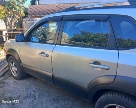 Серый Хендай Туксон, объемом двигателя 2 л и пробегом 234 тыс. км за 8200 $, фото 1 на Automoto.ua