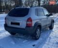 Серый Хендай Туксон, объемом двигателя 2.7 л и пробегом 294 тыс. км за 7500 $, фото 3 на Automoto.ua