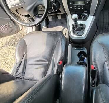 Серый Хендай Туксон, объемом двигателя 2 л и пробегом 260 тыс. км за 7000 $, фото 9 на Automoto.ua