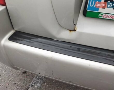 Серый Хендай Туксон, объемом двигателя 1.98 л и пробегом 278 тыс. км за 5300 $, фото 12 на Automoto.ua