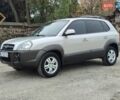 Серый Хендай Туксон, объемом двигателя 1.99 л и пробегом 210 тыс. км за 7900 $, фото 1 на Automoto.ua