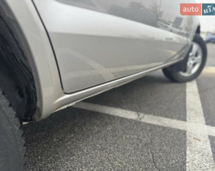 Серый Хендай Туксон, объемом двигателя 1.98 л и пробегом 175 тыс. км за 7800 $, фото 4 на Automoto.ua