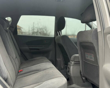 Серый Хендай Туксон, объемом двигателя 1.98 л и пробегом 241 тыс. км за 7000 $, фото 44 на Automoto.ua