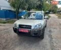 Сірий Хендай Туксон, об'ємом двигуна 2 л та пробігом 197 тис. км за 7800 $, фото 27 на Automoto.ua