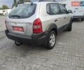 Серый Хендай Туксон, объемом двигателя 1.98 л и пробегом 168 тыс. км за 7500 $, фото 2 на Automoto.ua