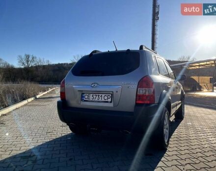 Серый Хендай Туксон, объемом двигателя 1.99 л и пробегом 156 тыс. км за 8200 $, фото 21 на Automoto.ua