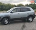 Серый Хендай Туксон, объемом двигателя 1.98 л и пробегом 260 тыс. км за 6800 $, фото 13 на Automoto.ua