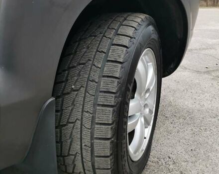 Сірий Хендай Туксон, об'ємом двигуна 1.98 л та пробігом 160 тис. км за 8000 $, фото 4 на Automoto.ua