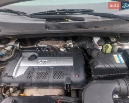 Серый Хендай Туксон, объемом двигателя 2 л и пробегом 226 тыс. км за 6200 $, фото 18 на Automoto.ua