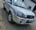 Серый Хендай Туксон, объемом двигателя 2 л и пробегом 260 тыс. км за 7000 $, фото 1 на Automoto.ua