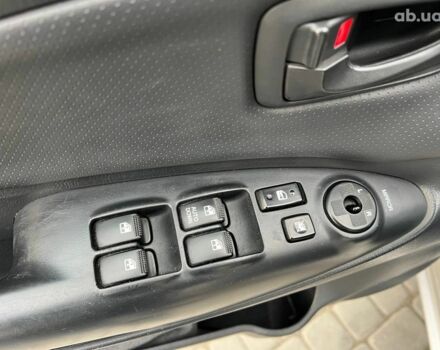 Сірий Хендай Туксон, об'ємом двигуна 2 л та пробігом 263 тис. км за 7440 $, фото 15 на Automoto.ua