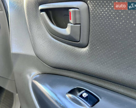 Сірий Хендай Туксон, об'ємом двигуна 2 л та пробігом 215 тис. км за 7350 $, фото 56 на Automoto.ua