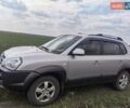 Серый Хендай Туксон, объемом двигателя 1.99 л и пробегом 354 тыс. км за 7500 $, фото 1 на Automoto.ua
