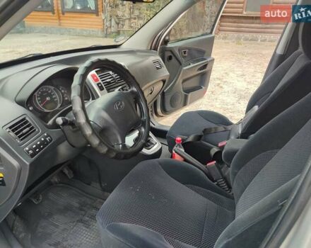 Серый Хендай Туксон, объемом двигателя 1.99 л и пробегом 210 тыс. км за 7900 $, фото 15 на Automoto.ua