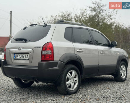 Серый Хендай Туксон, объемом двигателя 1.98 л и пробегом 241 тыс. км за 7000 $, фото 21 на Automoto.ua