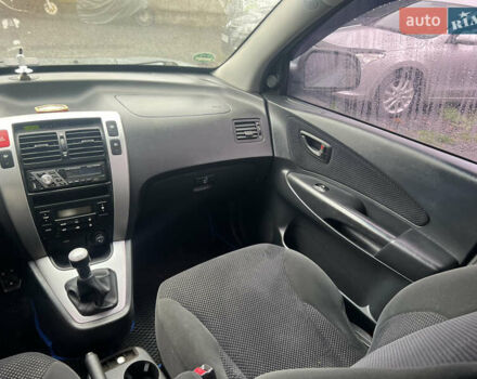 Серый Хендай Туксон, объемом двигателя 1.98 л и пробегом 253 тыс. км за 7650 $, фото 16 на Automoto.ua
