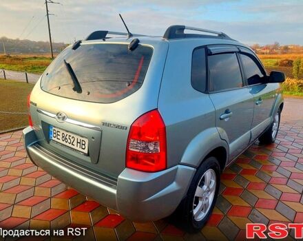 Серый Хендай Туксон, объемом двигателя 2 л и пробегом 175 тыс. км за 6250 $, фото 3 на Automoto.ua