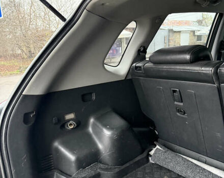 Серый Хендай Туксон, объемом двигателя 1.98 л и пробегом 193 тыс. км за 6500 $, фото 18 на Automoto.ua