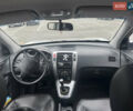Серый Хендай Туксон, объемом двигателя 1.98 л и пробегом 175 тыс. км за 7800 $, фото 13 на Automoto.ua