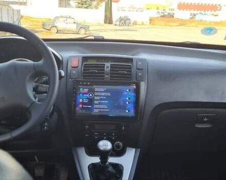 Сірий Хендай Туксон, об'ємом двигуна 1.99 л та пробігом 190 тис. км за 9600 $, фото 4 на Automoto.ua