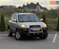 Серый Хендай Туксон, объемом двигателя 2 л и пробегом 296 тыс. км за 7800 $, фото 5 на Automoto.ua