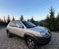 Сірий Хендай Туксон, об'ємом двигуна 1.99 л та пробігом 248 тис. км за 7599 $, фото 1 на Automoto.ua