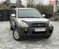 Серый Хендай Туксон, объемом двигателя 1.98 л и пробегом 252 тыс. км за 6950 $, фото 4 на Automoto.ua