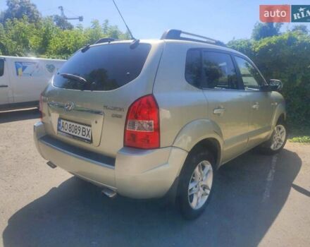 Сірий Хендай Туксон, об'ємом двигуна 2 л та пробігом 297 тис. км за 7300 $, фото 4 на Automoto.ua