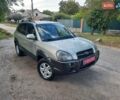 Сірий Хендай Туксон, об'ємом двигуна 2 л та пробігом 197 тис. км за 7800 $, фото 3 на Automoto.ua